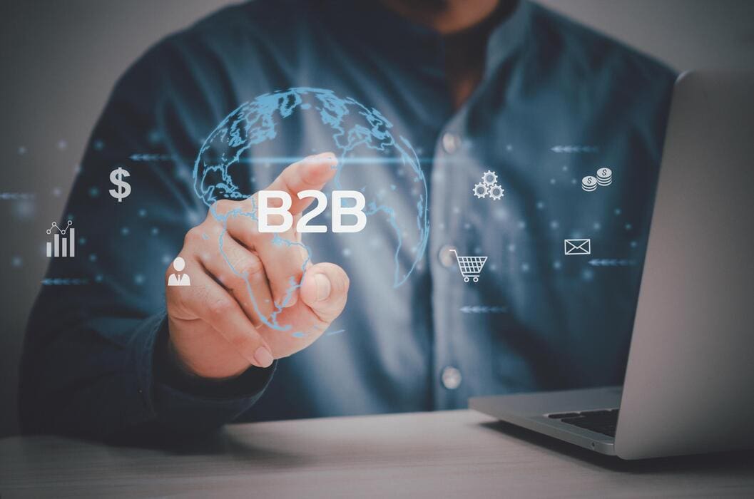 man-hand-using-laptop-virtual-screen-b2b-business-to-business-icons-and-symbols-business-digital-technology-marketing-online-concept-free-photo